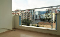 Furnished apartment 2+1, with a total area of 120 m2, on the 4th floor in the center of Mahmutlar.-id-3863-photo-7
