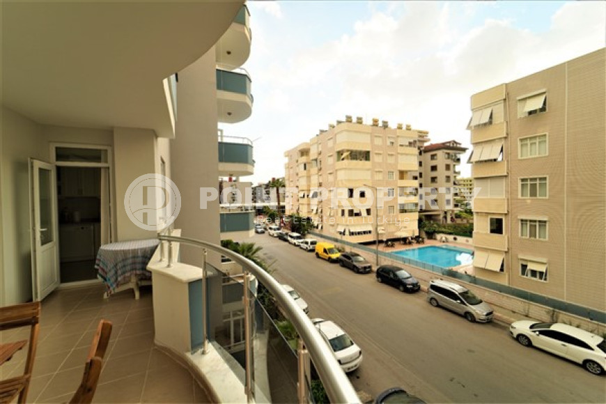 Furnished apartment 2+1, with a total area of 120 m2, on the 4th floor in the center of Mahmutlar.-id-3863-photo-8