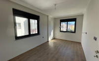 Small 1+1 apartment in fine finishing in the Gazipasa area.-id-3865-photo-2