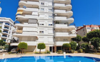 Spacious three-room apartment in Mahmutlar 5 minutes from the sea, 110m2-id-1043-photo-1