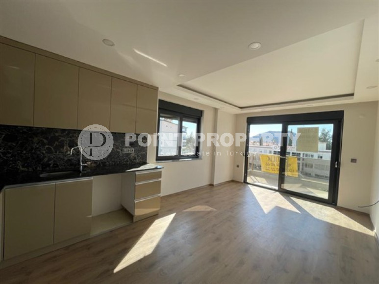 Small 1+1 apartment in fine finishing in the Gazipasa area.-id-3865-photo-4