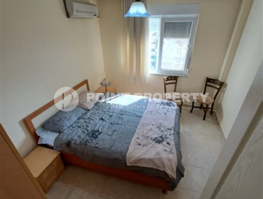 Apartment with three bedrooms in the center of Mahmutlar.-id-3866-photo-2