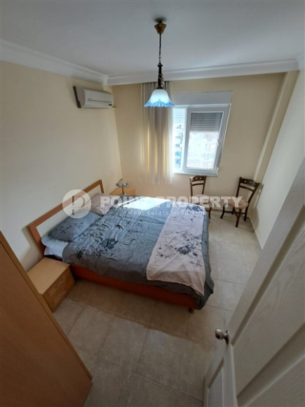 Apartment with three bedrooms in the center of Mahmutlar.-id-3866-photo-2