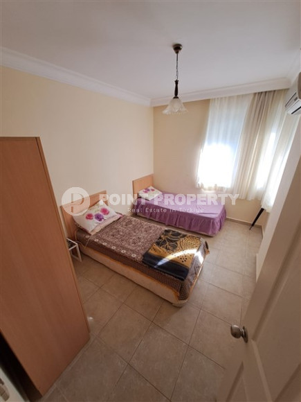 Apartment with three bedrooms in the center of Mahmutlar.-id-3866-photo-4