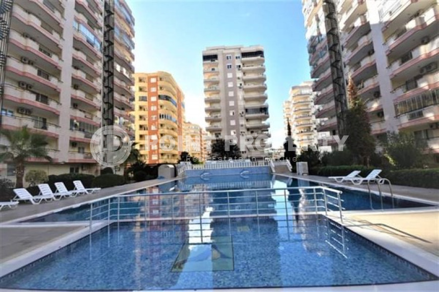 Apartment with three bedrooms in the center of Mahmutlar.-id-3866-photo-7