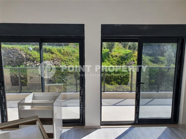 New luxury villa with an area of 440 m2 at the stage of completion of construction works, Kargicak area-id-3871-photo-2