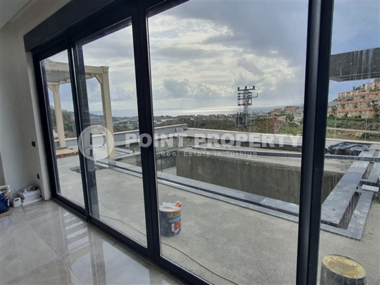 New luxury villa with an area of 440 m2 at the stage of completion of construction works, Kargicak area-id-3871-photo-11