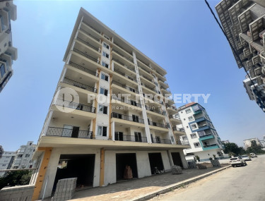 Four cozy two-room apartments with a 1+1 layout and an area of 60 m2 in a new complex in Mahmutlar, 400 meters from the sea-id-1328-photo-1