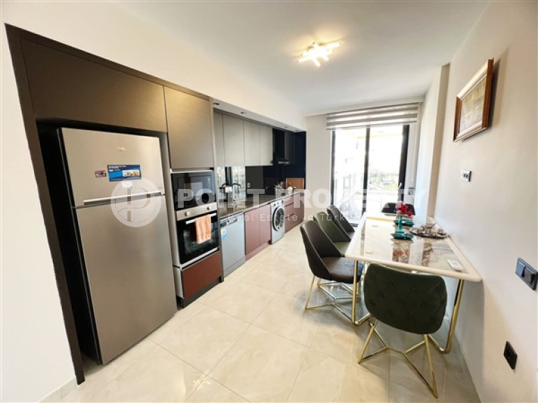 Furnished apartment in good repair in the center of Mahmutlar.-id-3879-photo-4