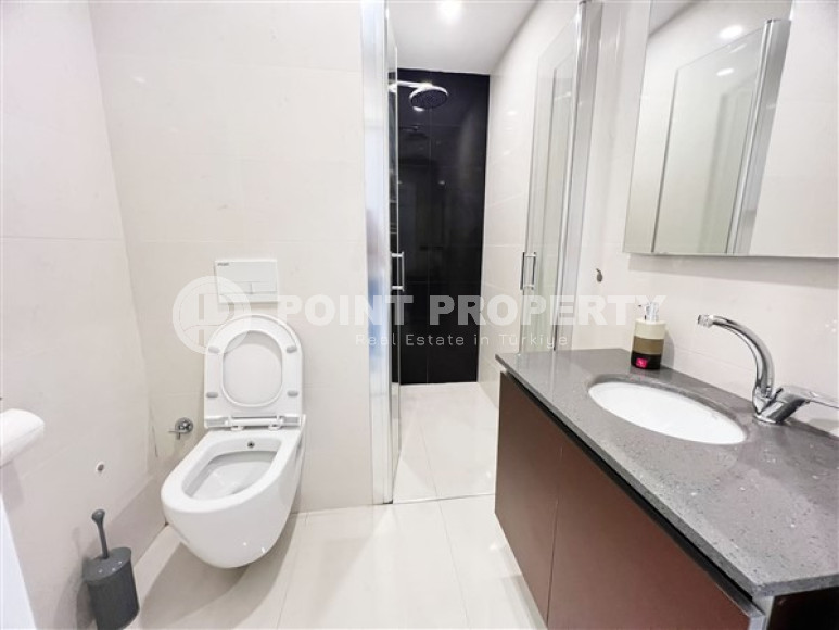 Furnished apartment in good repair in the center of Mahmutlar.-id-3879-photo-9