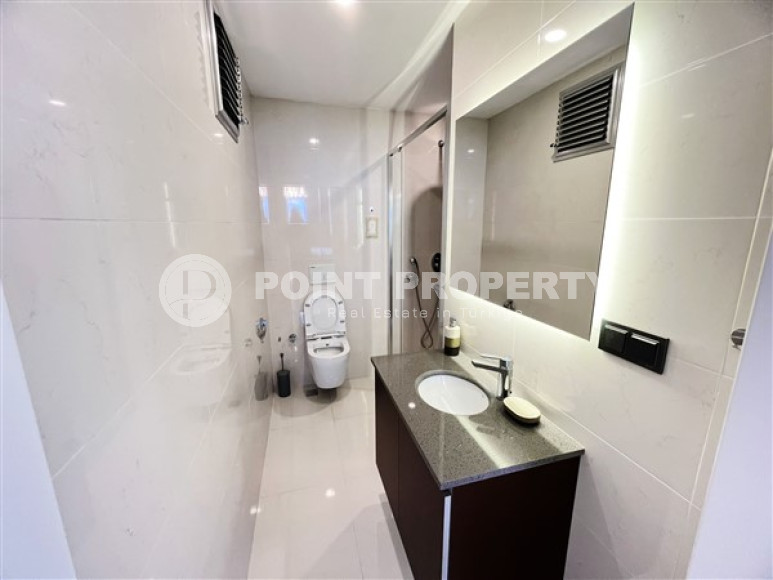 Furnished apartment in good repair in the center of Mahmutlar.-id-3879-photo-10