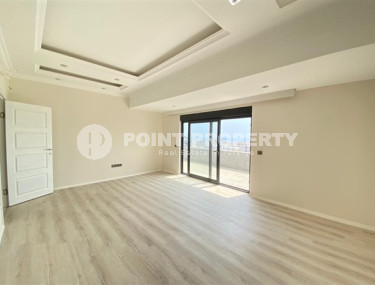 Duplex apartment on the 10th floor with an attic in Alanya's popular Mahmutlar area.-id-3882-photo-3