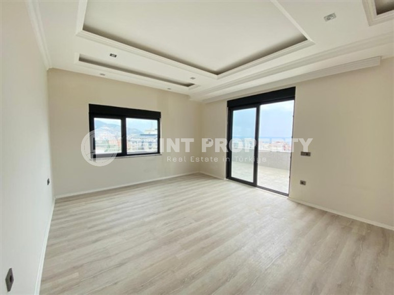 Duplex apartment on the 10th floor with an attic in Alanya's popular Mahmutlar area.-id-3882-photo-5