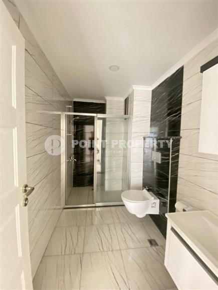 Duplex apartment on the 10th floor with an attic in Alanya's popular Mahmutlar area.-id-3882-photo-7