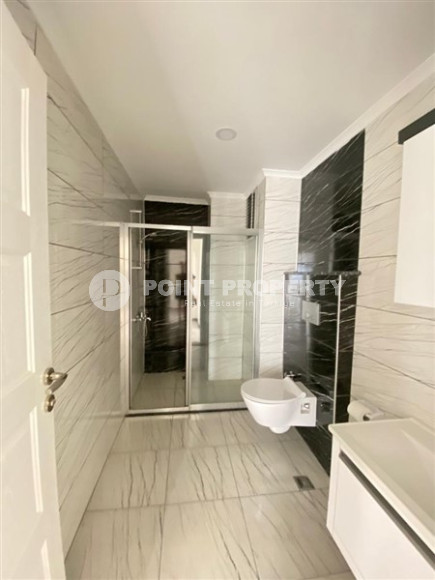 Duplex apartment on the 10th floor with an attic in Alanya's popular Mahmutlar area.-id-3882-photo-8