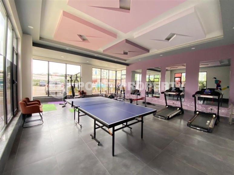 Duplex apartment on the 10th floor with an attic in Alanya's popular Mahmutlar area.-id-3882-photo-10