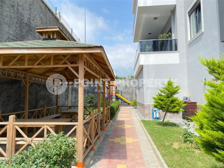 Duplex apartment on the 10th floor with an attic in Alanya's popular Mahmutlar area.-id-3882-photo-12