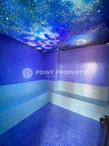 Duplex apartment on the 10th floor with an attic in Alanya's popular Mahmutlar area.-id-3882-photo-13