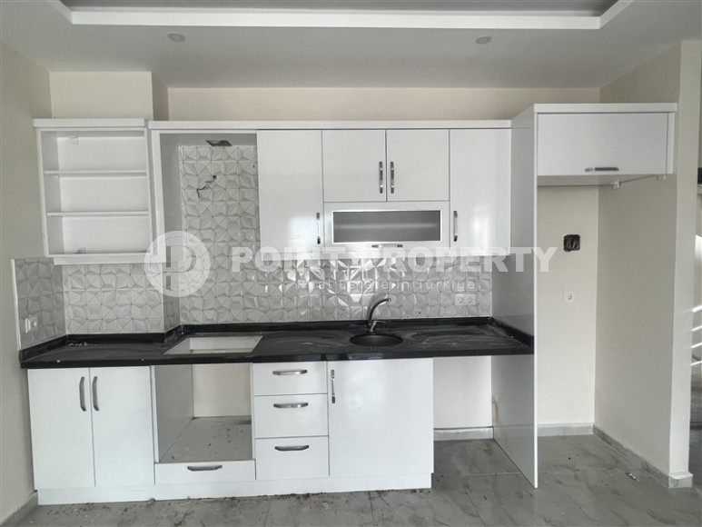 Four cozy two-room apartments with a 1+1 layout and an area of 60 m2 in a new complex in Mahmutlar, 400 meters from the sea-id-1328-photo-10