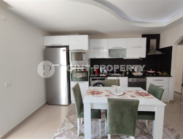 Apartment 2+1, with a total area of 110 m2, in the center of Mahmutlar.-id-3884-photo-2