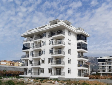 Недорогие двухкомнатные апартаменты 50 м2 в недавно построенном комплексе в 500 метрах от моря, Каргыджак-id-3895-фото-1