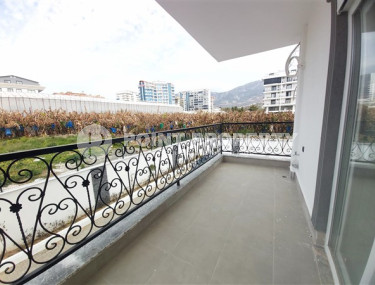 Недорогие двухкомнатные апартаменты 50 м2 в недавно построенном комплексе в 500 метрах от моря, Каргыджак-id-3895-фото-2