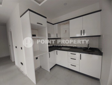 Недорогие двухкомнатные апартаменты 50 м2 в недавно построенном комплексе в 500 метрах от моря, Каргыджак-id-3895-фото-3