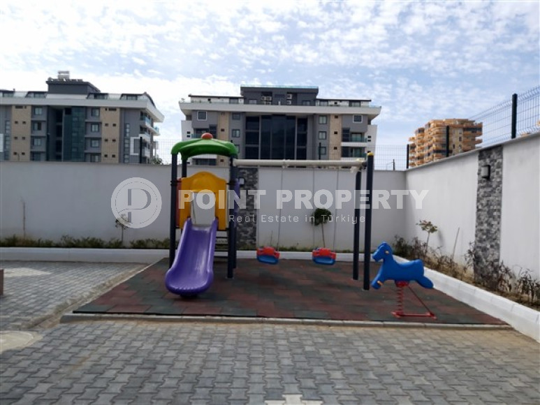 Inexpensive two-room apartment 50 m2 in a newly built complex 500 meters from the sea, Kargicak-id-3895-photo-15