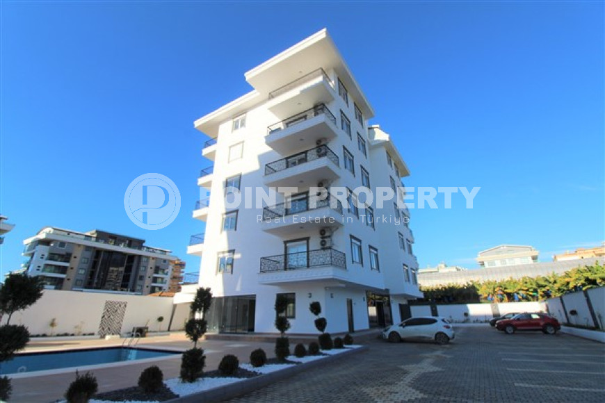 Inexpensive two-room apartment 50 m2 in a newly built complex 500 meters from the sea, Kargicak-id-3895-photo-17