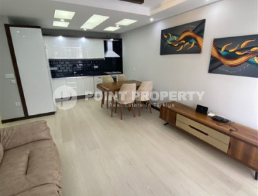 Двухкомнатные апартаменты 1+1 в новой резиденции с отличной инфраструктурой и бассейном на крыше, район Махмутлар-id-3896-фото-2