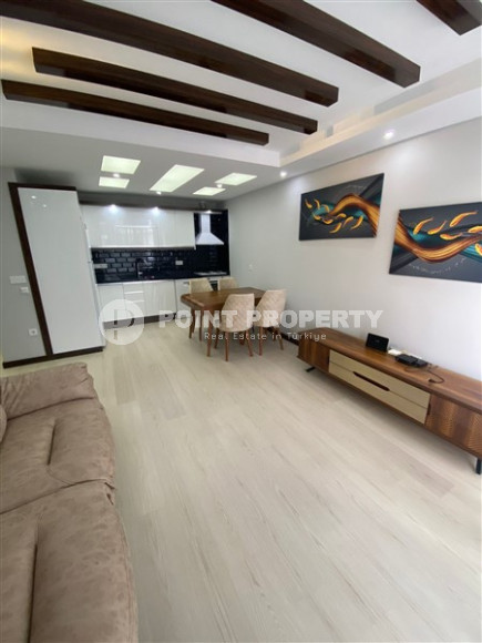 Двухкомнатные апартаменты 1+1 в новой резиденции с отличной инфраструктурой и бассейном на крыше, район Махмутлар-id-3896-фото-2