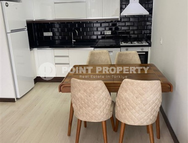 Двухкомнатные апартаменты 1+1 в новой резиденции с отличной инфраструктурой и бассейном на крыше, район Махмутлар-id-3896-фото-4