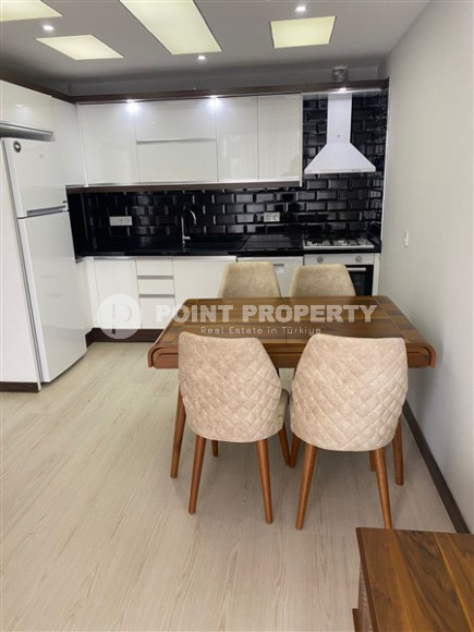 Двухкомнатные апартаменты 1+1 в новой резиденции с отличной инфраструктурой и бассейном на крыше, район Махмутлар-id-3896-фото-4