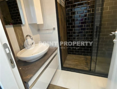 Двухкомнатные апартаменты 1+1 в новой резиденции с отличной инфраструктурой и бассейном на крыше, район Махмутлар-id-3896-фото-5