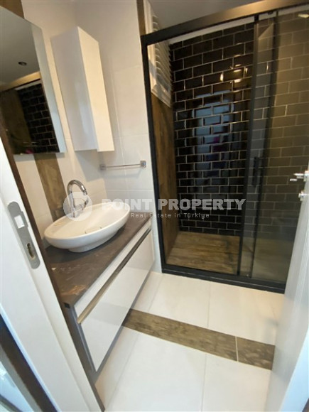 Двухкомнатные апартаменты 1+1 в новой резиденции с отличной инфраструктурой и бассейном на крыше, район Махмутлар-id-3896-фото-5