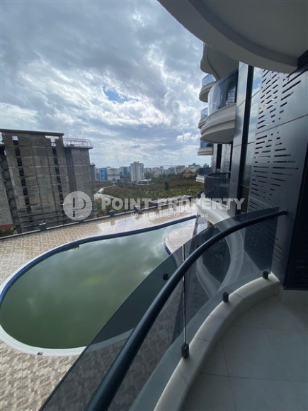 Двухкомнатные апартаменты 1+1 в новой резиденции с отличной инфраструктурой и бассейном на крыше, район Махмутлар-id-3896-фото-6