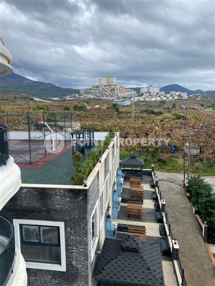 Двухкомнатные апартаменты 1+1 в новой резиденции с отличной инфраструктурой и бассейном на крыше, район Махмутлар-id-3896-фото-7