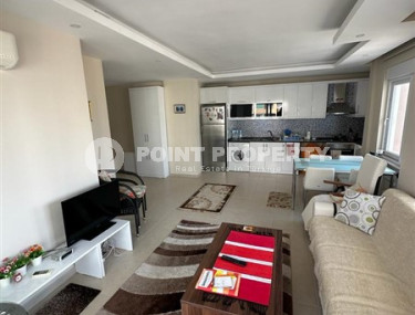 Small furnished one-bedroom apartment 500 meters from the sea in the center of Mahmutlar.-id-3899-photo-1