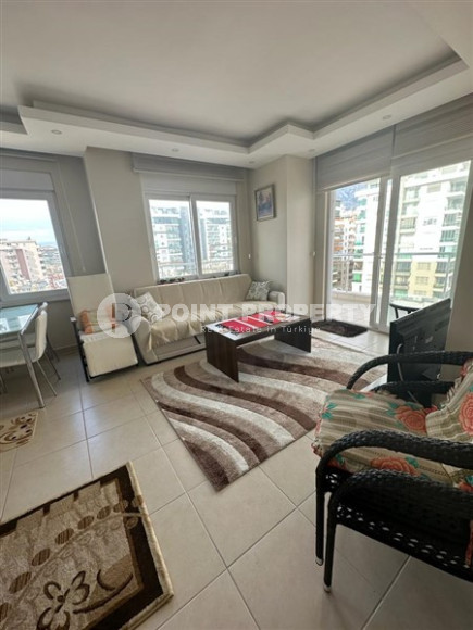 Small furnished one-bedroom apartment 500 meters from the sea in the center of Mahmutlar.-id-3899-photo-3