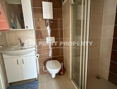 Small furnished one-bedroom apartment 500 meters from the sea in the center of Mahmutlar.-id-3899-photo-5