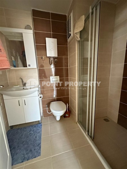 Small furnished one-bedroom apartment 500 meters from the sea in the center of Mahmutlar.-id-3899-photo-5