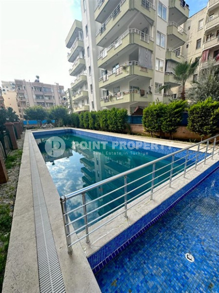 Small furnished one-bedroom apartment 500 meters from the sea in the center of Mahmutlar.-id-3899-photo-9