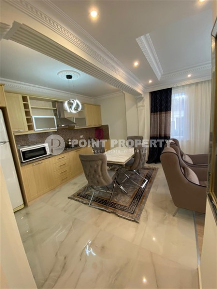 Комфортабельная квартира с двумя спальными комнатами в 400 метрах от моря.-id-3902-фото-2