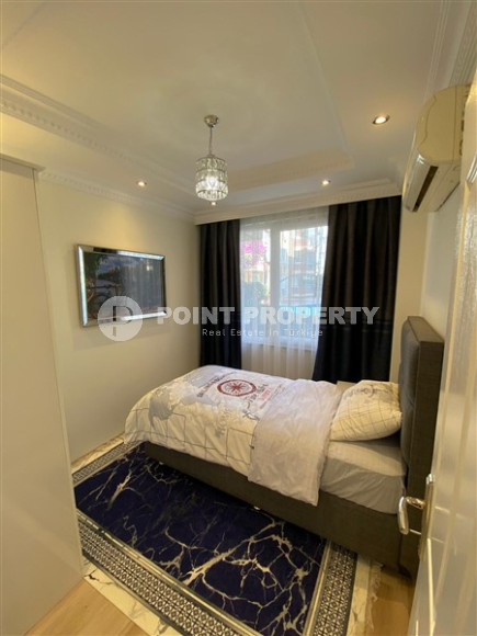 Комфортабельная квартира с двумя спальными комнатами в 400 метрах от моря.-id-3902-фото-4