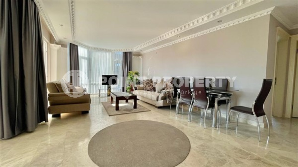 Cozy apartment 2+1, with a total area of 110 m2, on the 3rd floor in a quiet, landscaped area of Cikcilli.-id-3903-photo-2