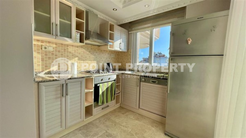 Cozy apartment 2+1, with a total area of 110 m2, on the 3rd floor in a quiet, landscaped area of Cikcilli.-id-3903-photo-3