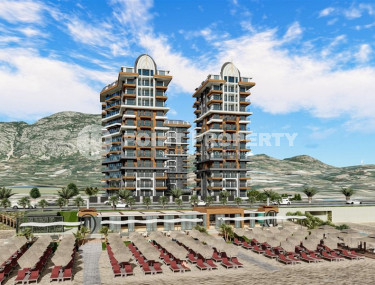 Two-room apartment on the 1st floor in a residence built in 2023 on the first coastline, Mahmutlar-id-3904-photo-1