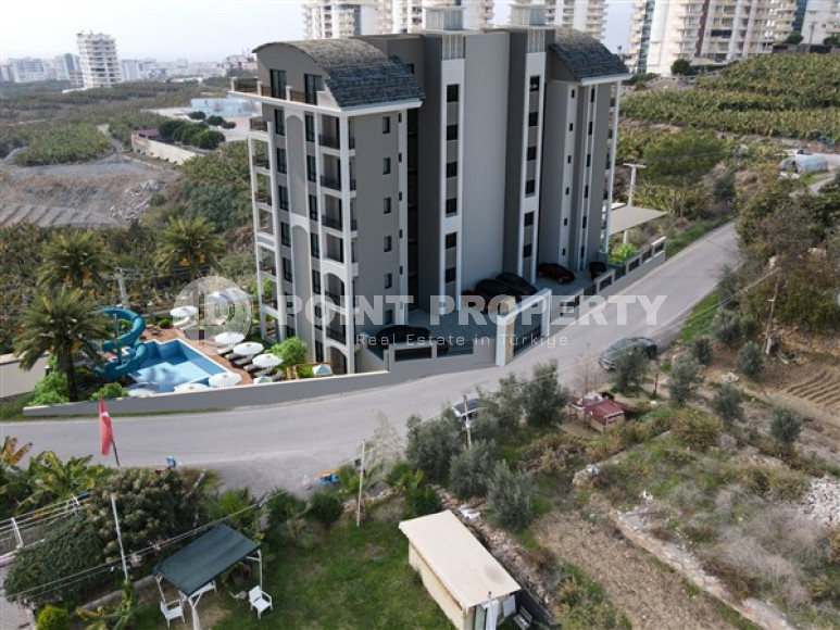 New apartments and duplexes in the popular Mahmutlar area.-id-3907-photo-8