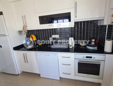 Cozy two-room apartment with a 1+1 layout and an area of 75 m2 in a complex with a swimming pool in the Mahmutlar area, 400 meters from the sea-id-1329-photo-4