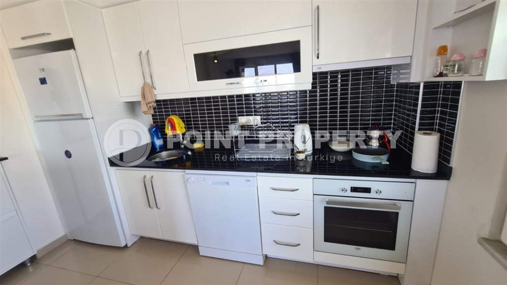 Cozy two-room apartment with a 1+1 layout and an area of 75 m2 in a complex with a swimming pool in the Mahmutlar area, 400 meters from the sea-id-1329-photo-4